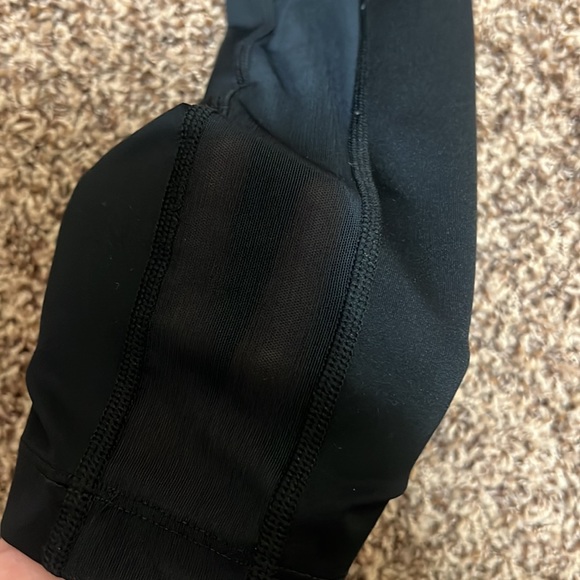 Nike Dri Fit size small black leggings. EUC. zip back pocket, mesh calf detail. - Picture 7 of 11